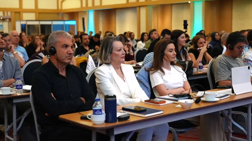Attentive audience with translation headsets